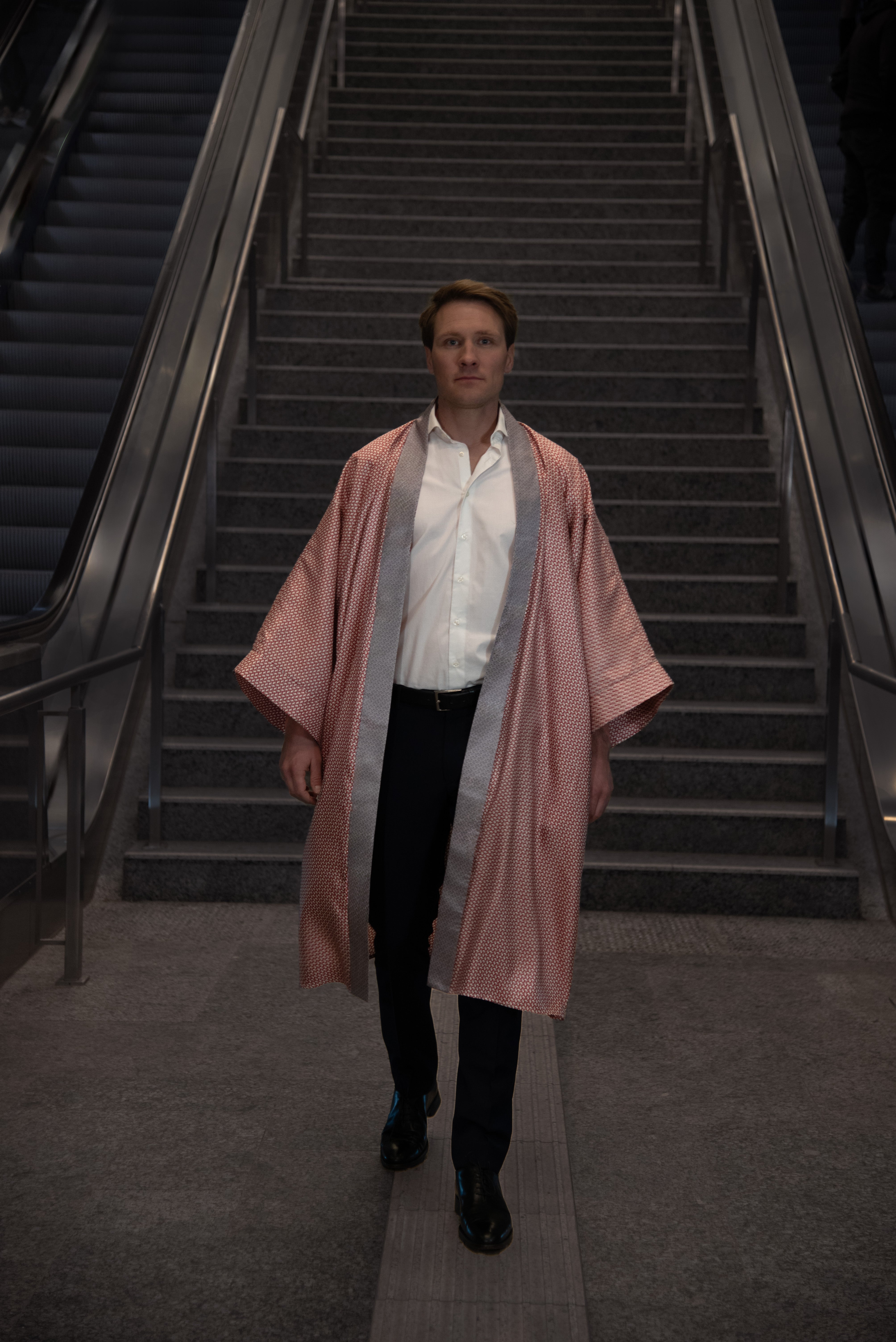 Model wearing Merlot Silk Kimono with a discreet ivory elephant print, showcasing front view.