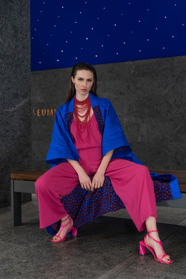 Model showing Hallucinatory Polka Dream Kimono (solid blue) inside-out